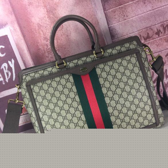 G*u*i top handle bags